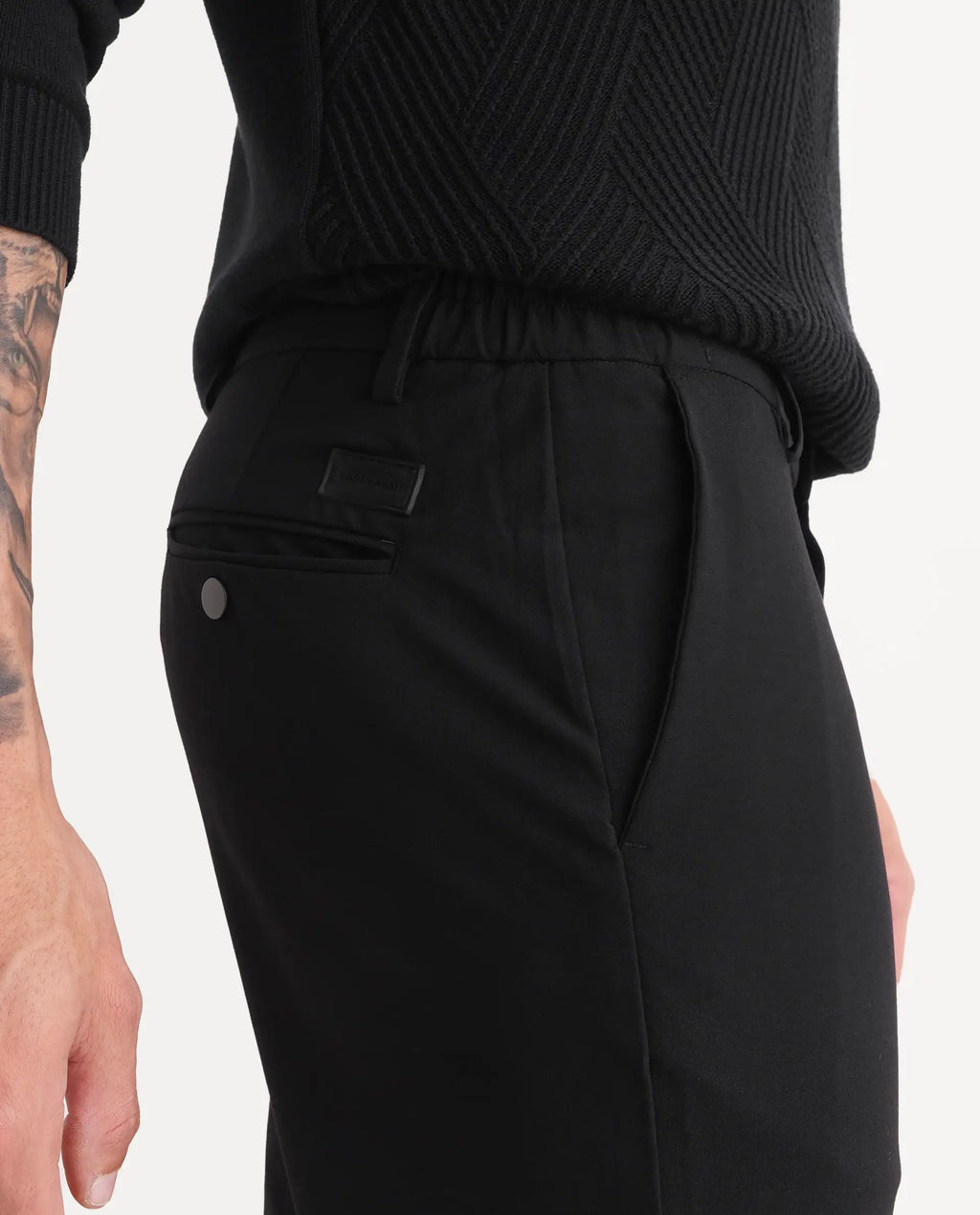 Rare Rabbit Men's Travel-24 Black Poly Viscose Lycra Fabric Blend Solid Trousers